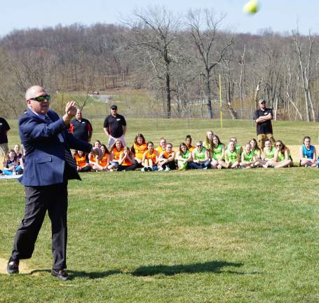 Deputy Mayor Ronald Bassani throws the Ceremonial First Softball Pitch.