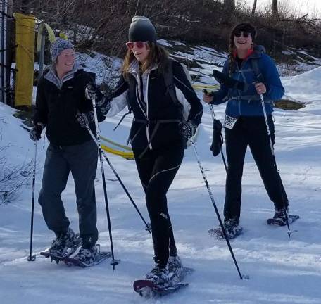 Inaugural Viking Snowshoe Invasion draws 80 A group snowshoes during the event.