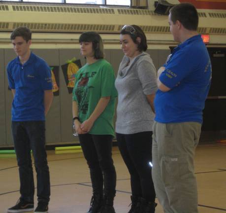Robotics team members Brian Hill, Alyssa Koehlar, Juliana Schlichting and Brandon O&#xfe;&#xc4;&#xf4; Connell participate in a Q and A session with the younger students.