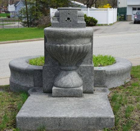 The Munson Street fountain stands without its column and cap.