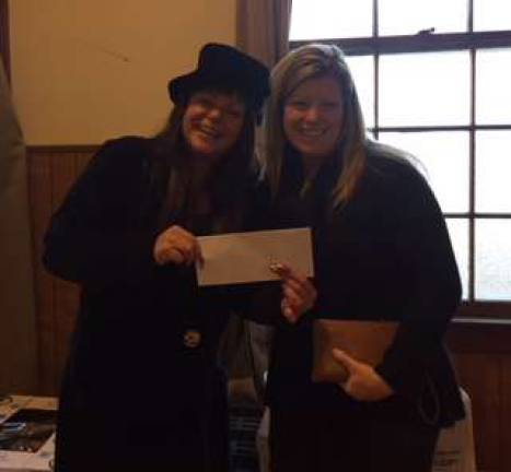 Donation Kelly Weller from the Vernon Board of Recreation handing Denise O’Conner from the Harvest House a check for $3011.50. Harvest House typically feed 60 – 75 people a day, which is truly a massive undertaking for an entity that relies on donations in order to exist.