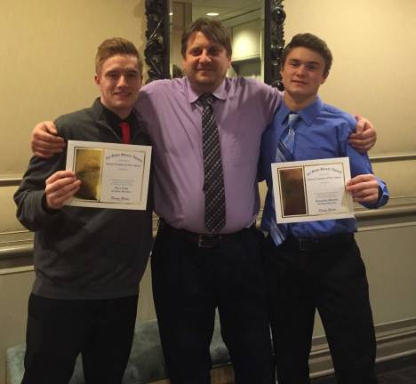Show, from left, senior midfielder Nik Polizos, head coach Joe Jones, senior goalkeeper Parker Shade. Polizos (1st team all-state) and Shade (Honorable Mention all-state) were recognized at the 48th Annual Soccer Coaches Association of NJ Banquet at the Pines Manor in Edison N.J.