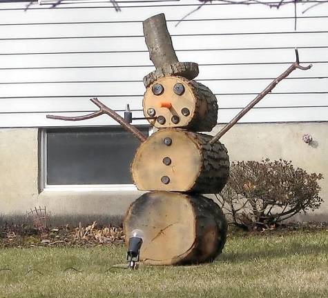 With the absence of January and February snow, a resident of Breakneck Road in Highland Lakes decided to create a snowman from alternate materials.