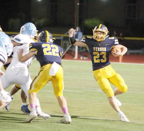 Vernon ball carrier Aden Moskovitz moves toward an opening during a play.