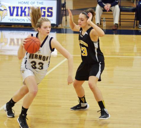 Vernon's Samantha Dulmer moves the ball past West Milford's Aly Roskowsky.