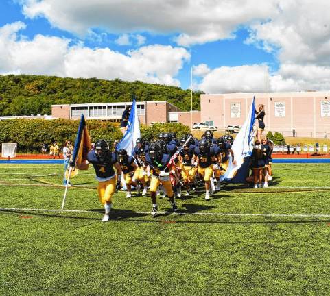 UPDATED: Football roundup: Kittatinny beats Saddle Brook <b>The Jefferson Township High School football team runs onto its home field for the season opener against High Point on Saturday, Aug. 30.</b>