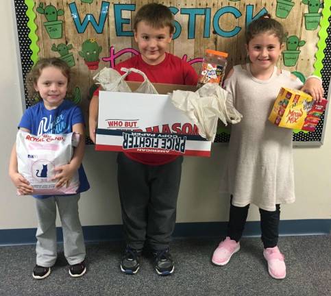 Sussex Wantage district sponsoring supply drive Sadie Lutz, Richard Bednarz, Jr., and Gisella Maritato from Ms. Roy's Kindergarten Class.