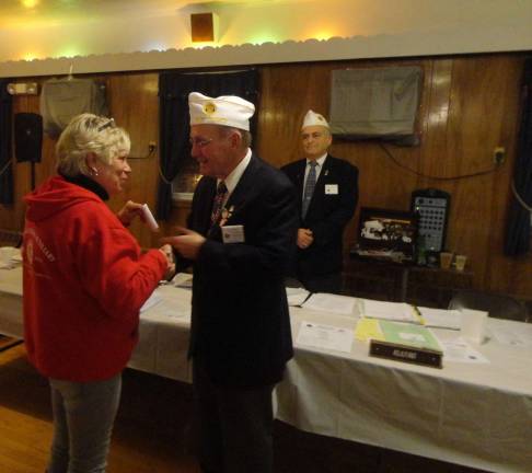 County Legion posts come together to support veterans’ recovery Photo by Scott Baker The American Legion Ladies' Auxiliary presents a $1,500 check to furnish a entire room at Veteran's Haven North.