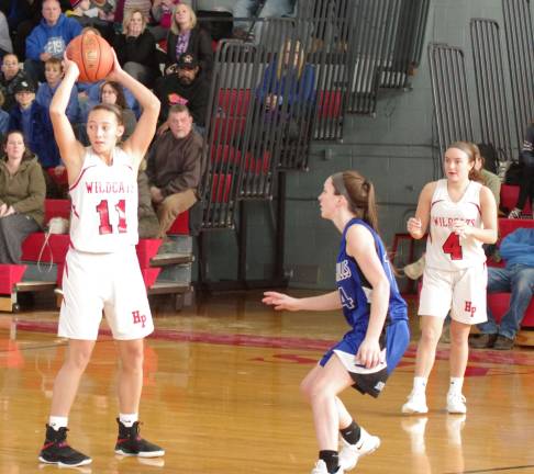 High Point posts win over Warren Hills High Point's Tyra Wingle holds the ball as she looks for an open teammate to pass to.