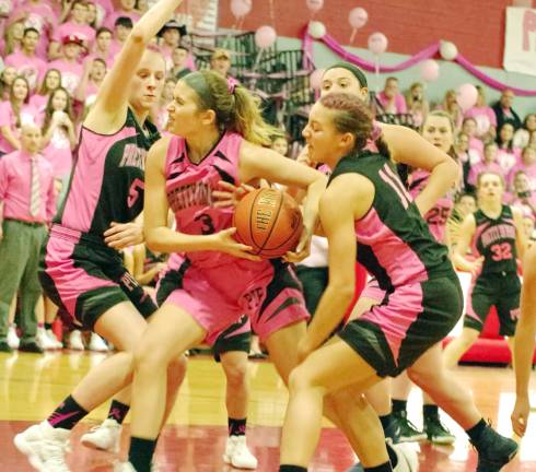 High Point wins Pretty in Pink classic Newton's Madison Leonardo advances the ball against High Point defenders.