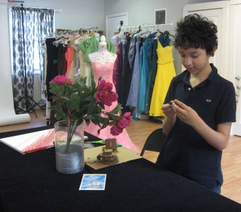 Andrew Sklar helps his mom Barbara during the Prom Dress Big Choice.