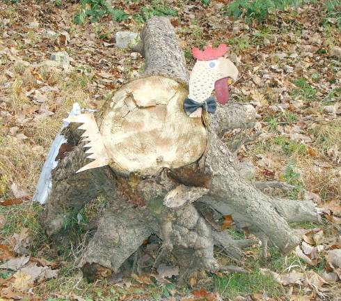 Someone dumped a stump on one of the pull- overs on Canistear Rd. in Vernon. The locals have been creatively decorating the stump for the holidays. The stump was dressed for Halloween and is currently a Thanksgiving gobbler.