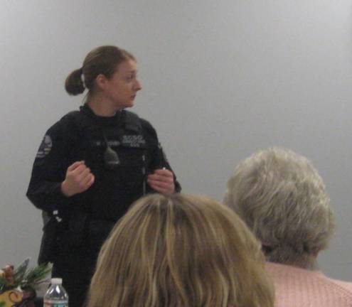 Officer Megan Grover of the Sussex County Sheriff&#x2019;s Office shares important information with members of the Woman&#x2019;s Club and their guests.