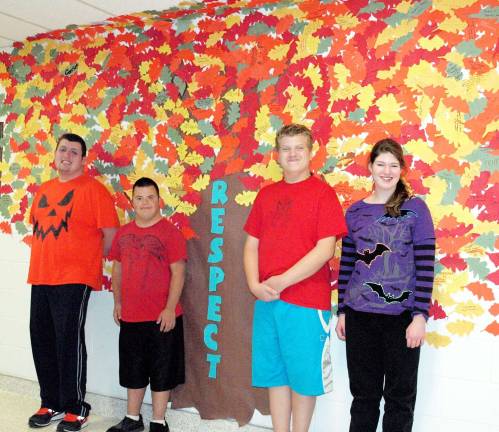 VTHS students knee-deep in respect Students who worked on the Vernon Township High School respect tree are (from left); Ricky Marotta, Tyler Hearn, Jory Aitchison and Rebecca Hill.