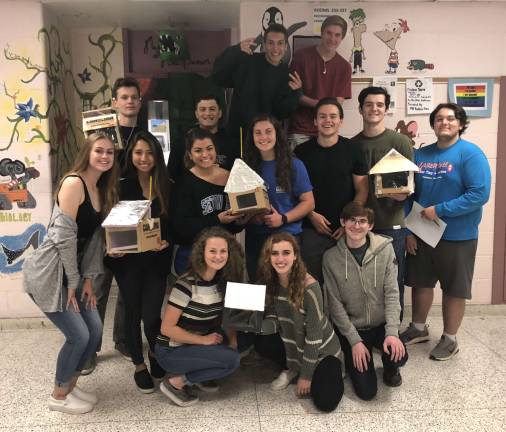 Environmental Science students in Cara Brown&#x2019;s class at Vernon Township High School show off the model houses they constructed using the principles of Passive Solar Design. From left to right, first row, Rebecca Annunziata, Gabriella Salvemini, Clayton Heidt. Second row, Kailyn Schofield, Kirna Cabrera, Jacqueline Villafuerte, Franki Potocki, Danny Denhert, Nick Peters and Tyler Janus. Last row, Paul McVeigh, Brandon Moser, Justin Kipilla and Kieran Sauer. The most successful design was created by the team of Franki Potocki, Jacqueline Villafuerte, and Meaghan Deming.