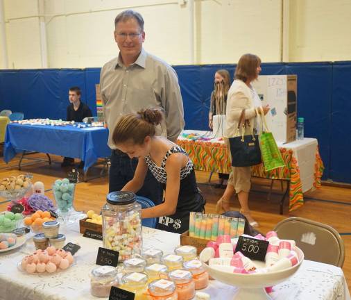 Sussex MS students sell their own products at market Wantage Mayor Bill Gaechter supports his daughter, pictured, and niece of C&K Essentials.