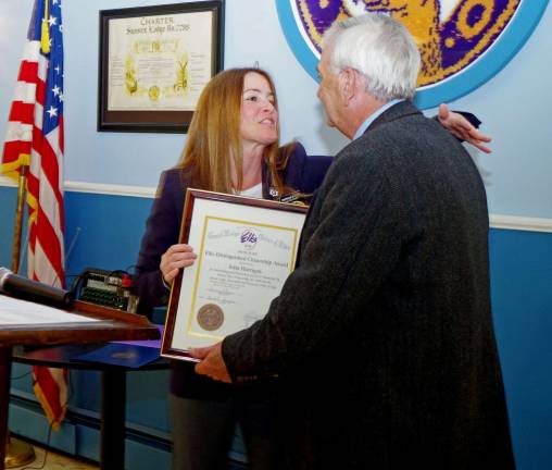 Sussex Elks honors Vernon resident John Harrigan Sussex Elks Exalted Ruler Patty Green presented Vernon resident John Harrigan with the Elks Distinguished Citizenship Award at a special Sunday evening dinner in Harrigan's honor.