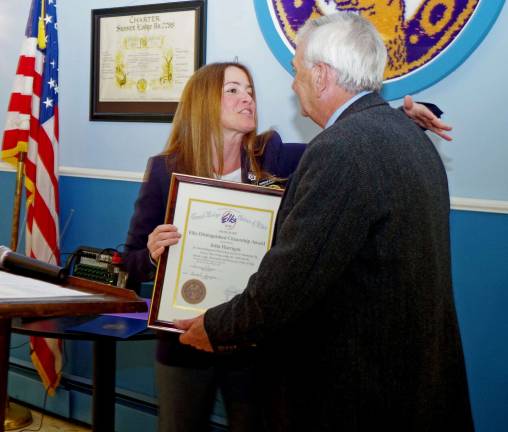 Sussex Elks Exalted Ruler Patty Green presented Vernon resident John Harrigan with the Elks Distinguished Citizenship Award at a special Sunday evening dinner in Harrigan's honor.