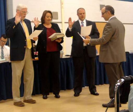 VTHS graduates running school board School board members, from left, John McGowan, Lori Lapera and David Sweier are sworn in at a recent worksession.