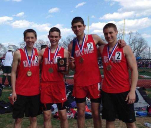 Joe Dragon (second from right) with High Point teammates at Morris Hills Relays. Dragon, now a sophomore at Syracuse, will return to speak at the camp where he fell in love with the sport of running.