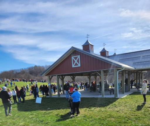 Residents gather for an Easter Egg Hunt at Woodbourne Park in Wantage.