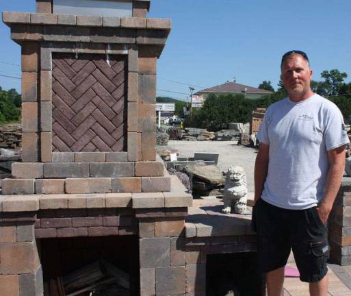 Rte. 23 Patio &amp; Mason Center's manager Sean with an assembled outdoor fireplace kit