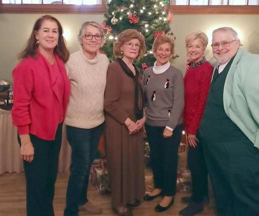 The Cruise Café held their annual Cruising into Christmas gathering recently at The Lafayette House. The group shared many travel insights and experiences and enjoyed fellowship and friendship. Several members are pictured with Carol Bezak, Cruise Café coordinator.