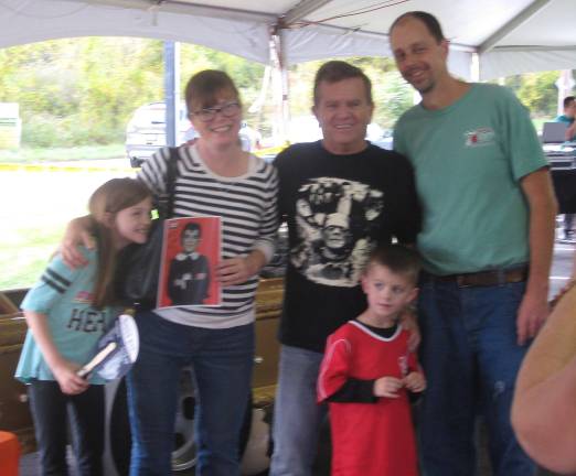 The Berberich family of Vernon and Butch Patrick (black shirt) pose for a photo at the Oct.14 event.
