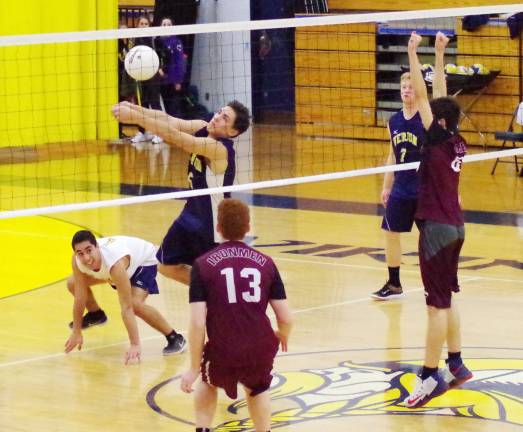 Vernon's Greg Wikiel bumps the ball. Vernon Township High School took on Don Bosco Preparatory High School in a boys varsity volleyball scrimmage on Friday, March 24.
