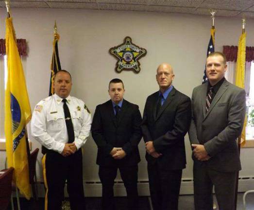 Sheriff Strada and Officers Mark Williams, Mark Peer, and Stephen Peterson.
