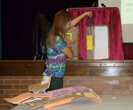 A seventh-grader demonstrates an Iron Man apartment at a recent Sussex-Wantage Board of Education meeting.
