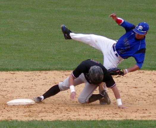 Late in the game Sussex shortstop Moises Roque tags sliding Morris runner Luke Magliaro. An official ruled Magliaro out. Roque was shaken up on the play but was able to continue.
