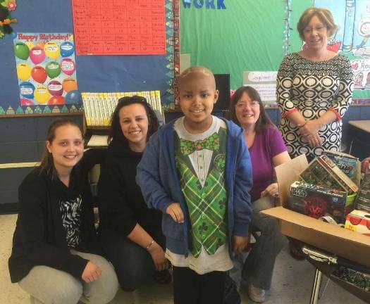 Sussex Fire Dept. donates to sick child Brittany McKay, Ali Bannon, Malaki Thomas, Debby Manners, MalakiþÄôs mom and Carey Roth, MalakiþÄôs teacher.