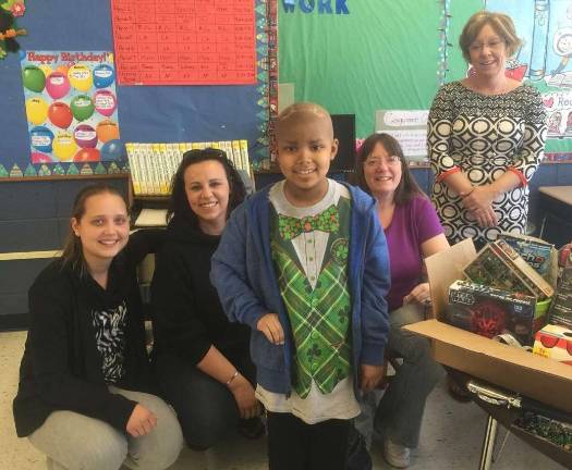 Brittany McKay, Ali Bannon, Malaki Thomas, Debby Manners, Malaki&#xfe;&#xc4;&#xf4;s mom and Carey Roth, Malaki&#xfe;&#xc4;&#xf4;s teacher.