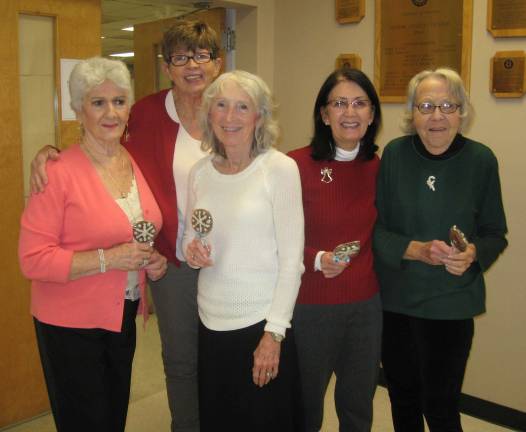 Seniors rock the center for Christmas PHOTOS BY JANET REDYKE Partiers Joan Stolarz, Lorraine Kraus, Kathy Grifone, Margaret Lieptattnier and Peg Agnelli canþÄôt wait to enjoy their chocolate holiday treat.