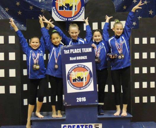 Giant Gymnastics has a banner year The first-place bronze team at the NY meet.