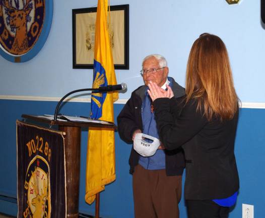 Retired Army lieutenant colonel Ernie Kosa is applauded after offering the invocation at the Sussex Elks veterans dinner. In his prayer he asked God to prevent veterans from committing suicide at a rate of 22 each day. Franklin&#xfe;&#xc4;&#xf4;s Kosa Veteran Support Center was named after the colonel.