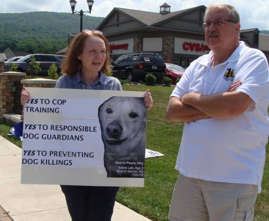 Angie Metler and Eleventh- Hour Animal Rescue volunteer Roger Kayser attended Saturday’s protest.