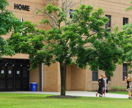 Students take one last picture in front of Wallkill Valley Regional High School at this year’s graduation (File photo by Vera Olinski)