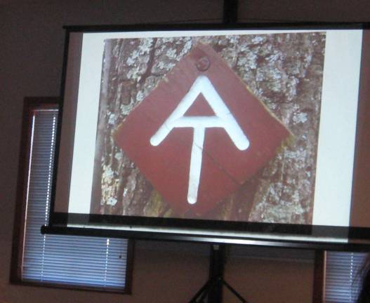 Library hosts talk on Appalachian Trail PHOTOS BY JANET REDYKEOne of the presentation’s slide photos show a sign created by Vernon teacher Jim Quinlan’s special needs class. The students produced enough of these signs to be featured on the entire Appalachian Trail.
