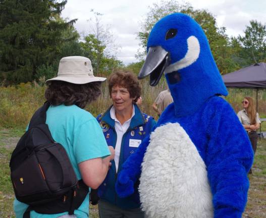 The blue goose mascot announced the celebratory cake for the visitors and volunteers.