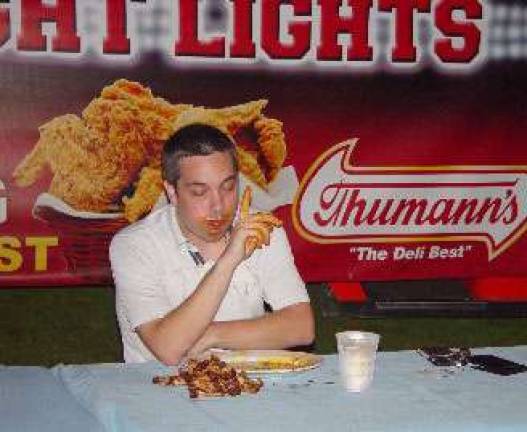 The winner of the Wing Eating Contest, Rob Zendzian declares himself No. 1.