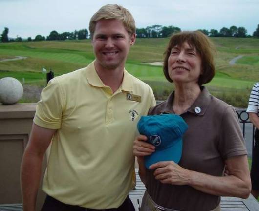Ballyowen 9 &amp; Dine Lady&#x2019;s Winner of Long Drive and Closest to the Pin, Claire Groeber with Crystal Event Coordinator Kevin.
