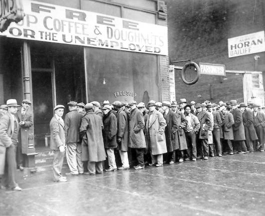 Unemployed men queued outside a soup kitchen in Chicago, 1931 (U.S. National Archives and Records Administration)