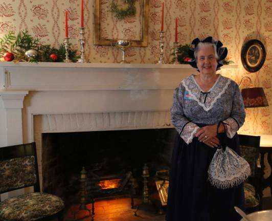 Gail Shawger dressed in period clothing for Christmas in July.