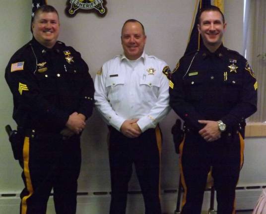 Sheriff announces promotions From left to right Sergeant Kieran McMorrow, Sheriff Michael F Strada, Detective Sergeant William Ficacci