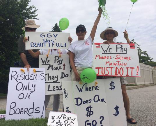 PHOTO BY DIANA GOOVAERETS Protesters are shown on July 22.