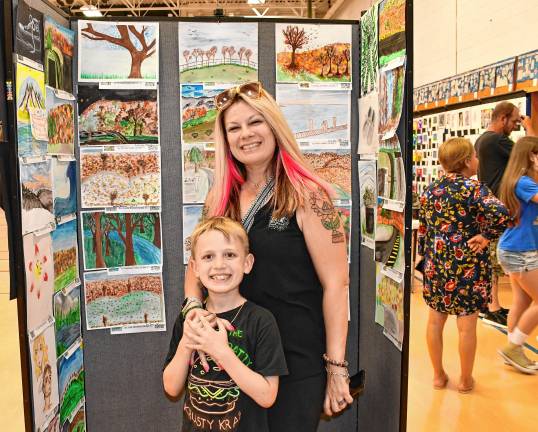 Photos: Artstanding 2025 in Vernon Lajos and Melissa Latronico of Vernon.