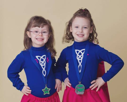 James Robine of Milford, Pa. &quot;Madeline Egan and Emma Robine, both of Sunrise Lake, pose after competing at the Irish Dance Competition at Dingman Delaware Middle School hosted by the Kenny Cavanaugh School of Irish Dance this past February.&quot;