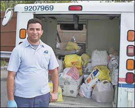 Postal supervisor applauds all who helped gather and deliver food Postal supervisor applauds all who helped gather and deliver food